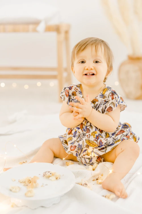 main enfant bonheur robe rose